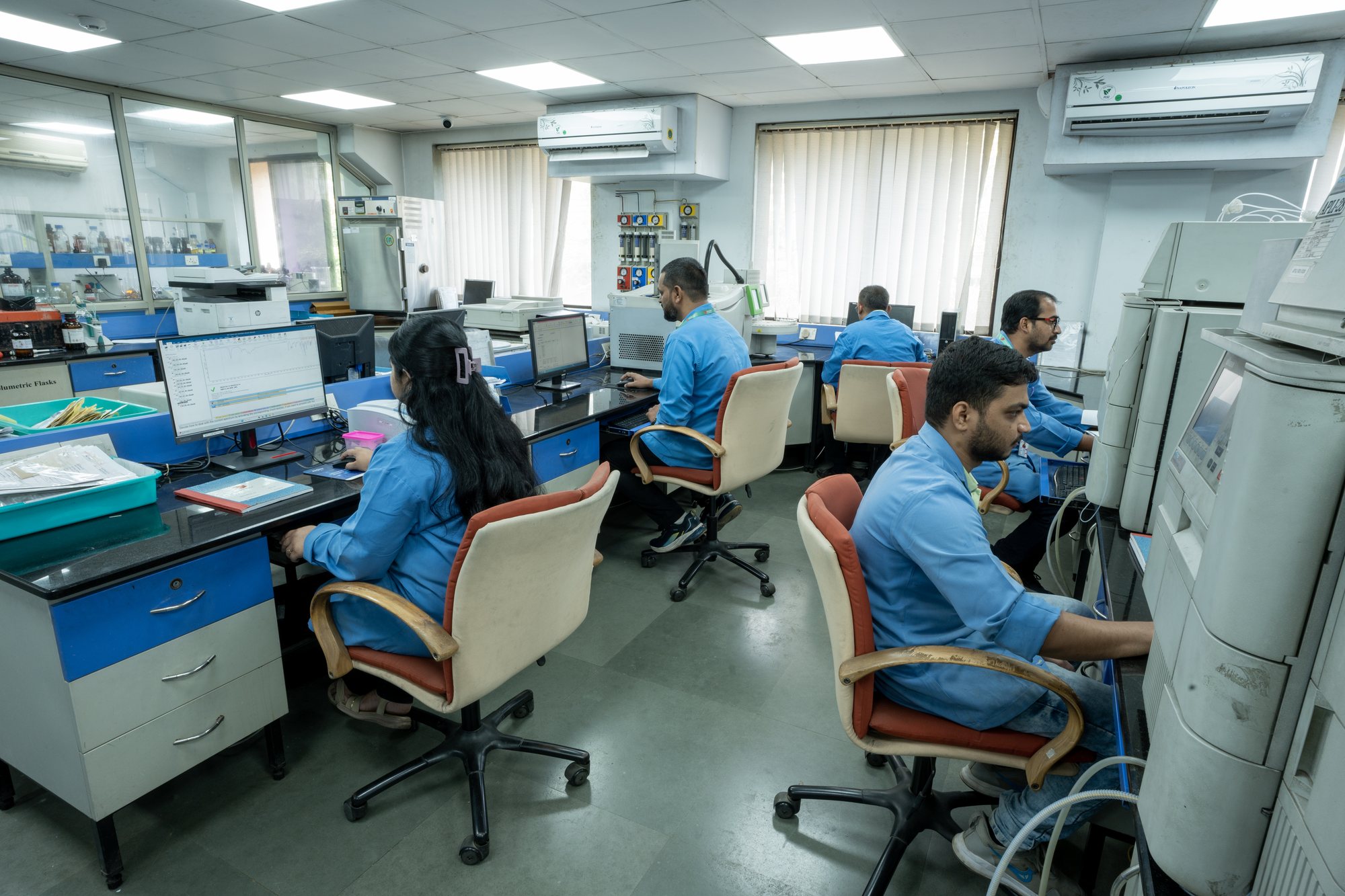 Analysts at work in the Analytical Development Lab, Anuh Pharma R&D